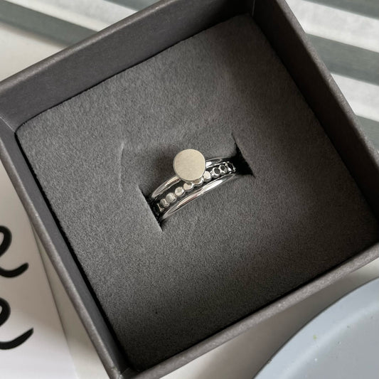silver pebble ring stack in box