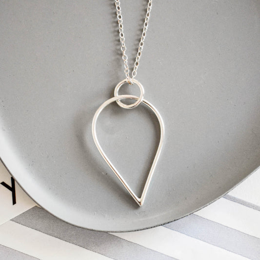 teardrop and circle pendant silver