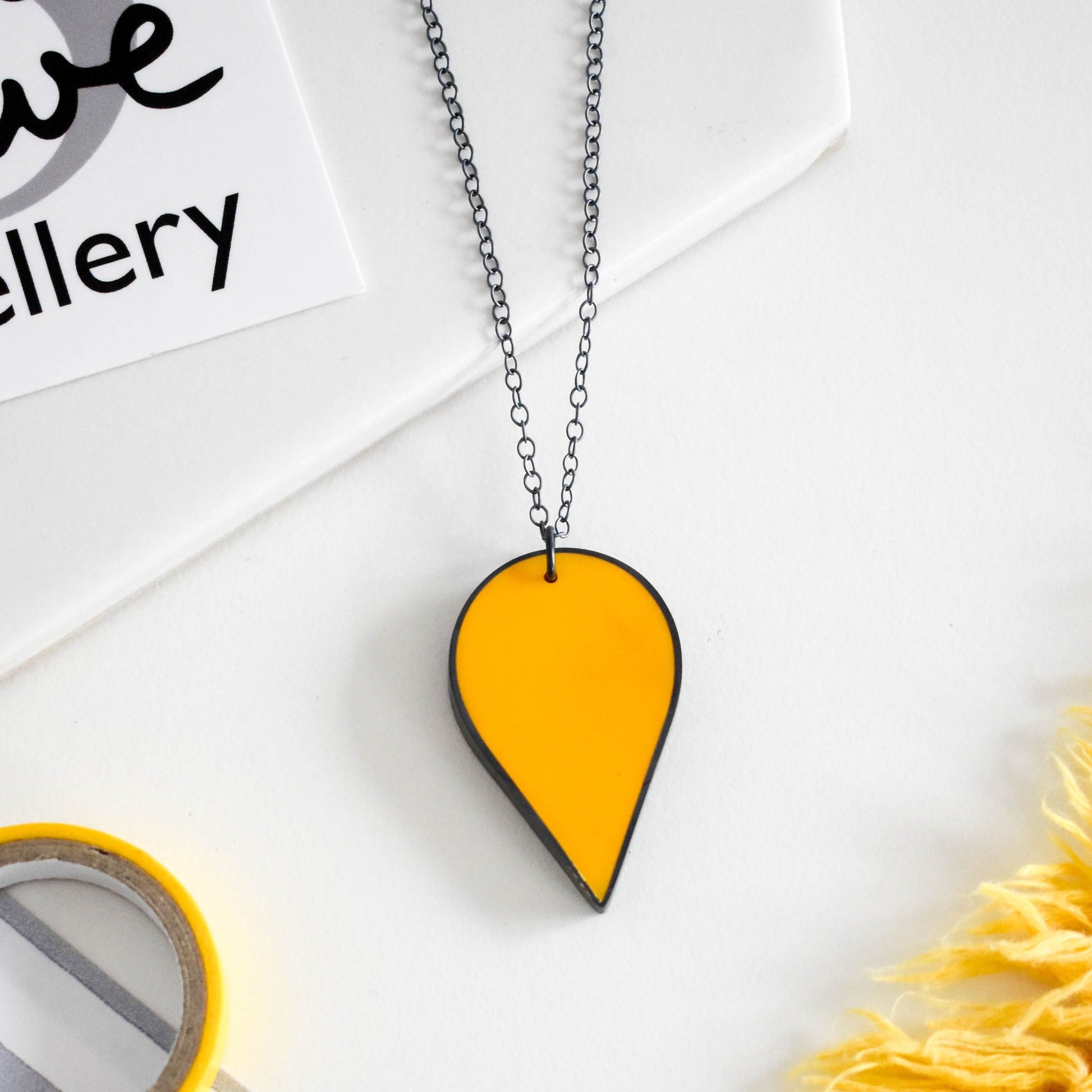 small yellow teardrop pendant