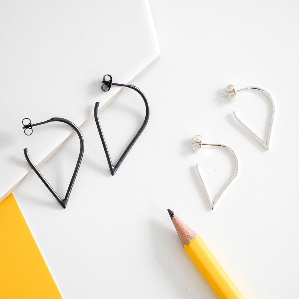 Silver teardrop hoop earrings